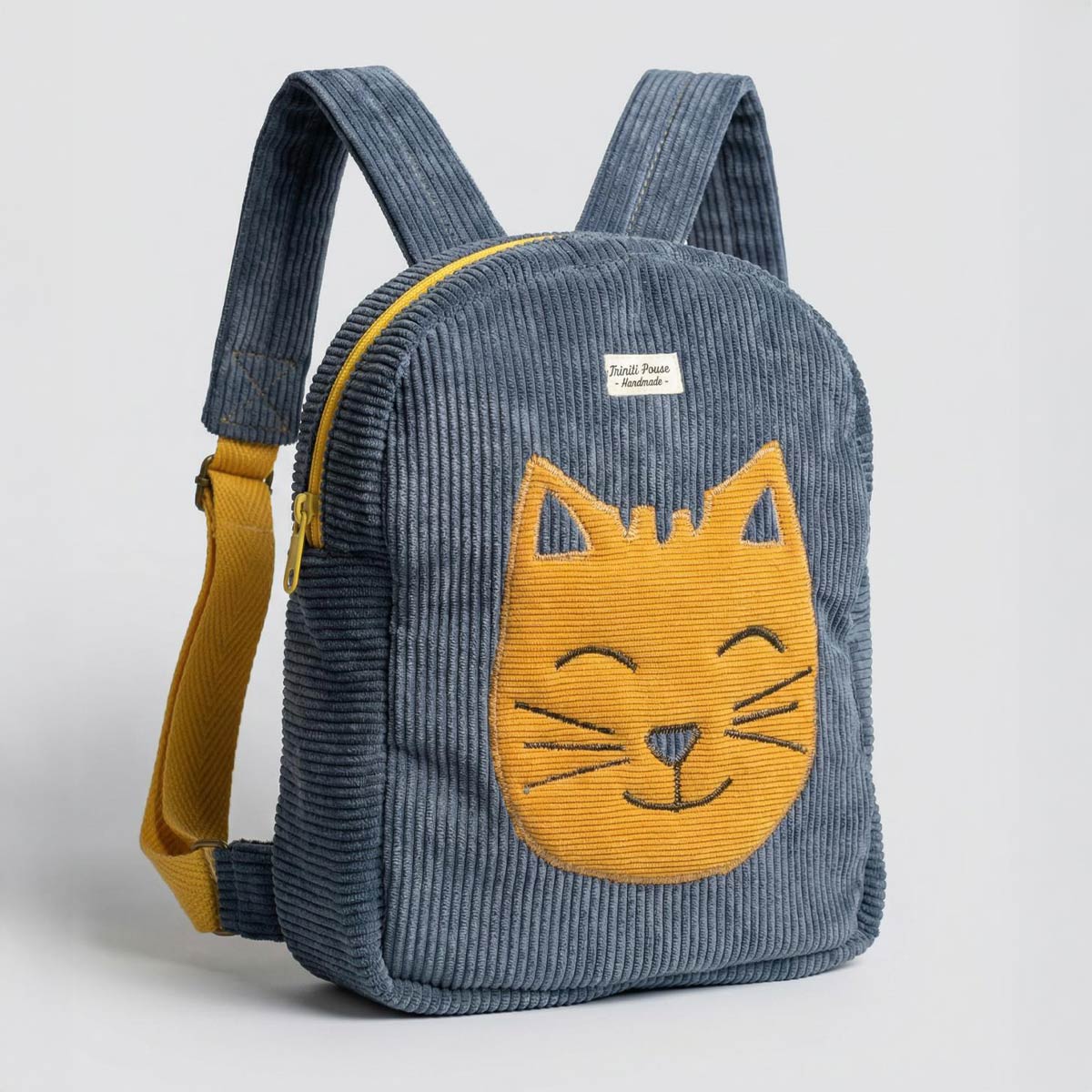 Mochila infantil de pana con gato Mochila infantil de pana con gato en el frontal
