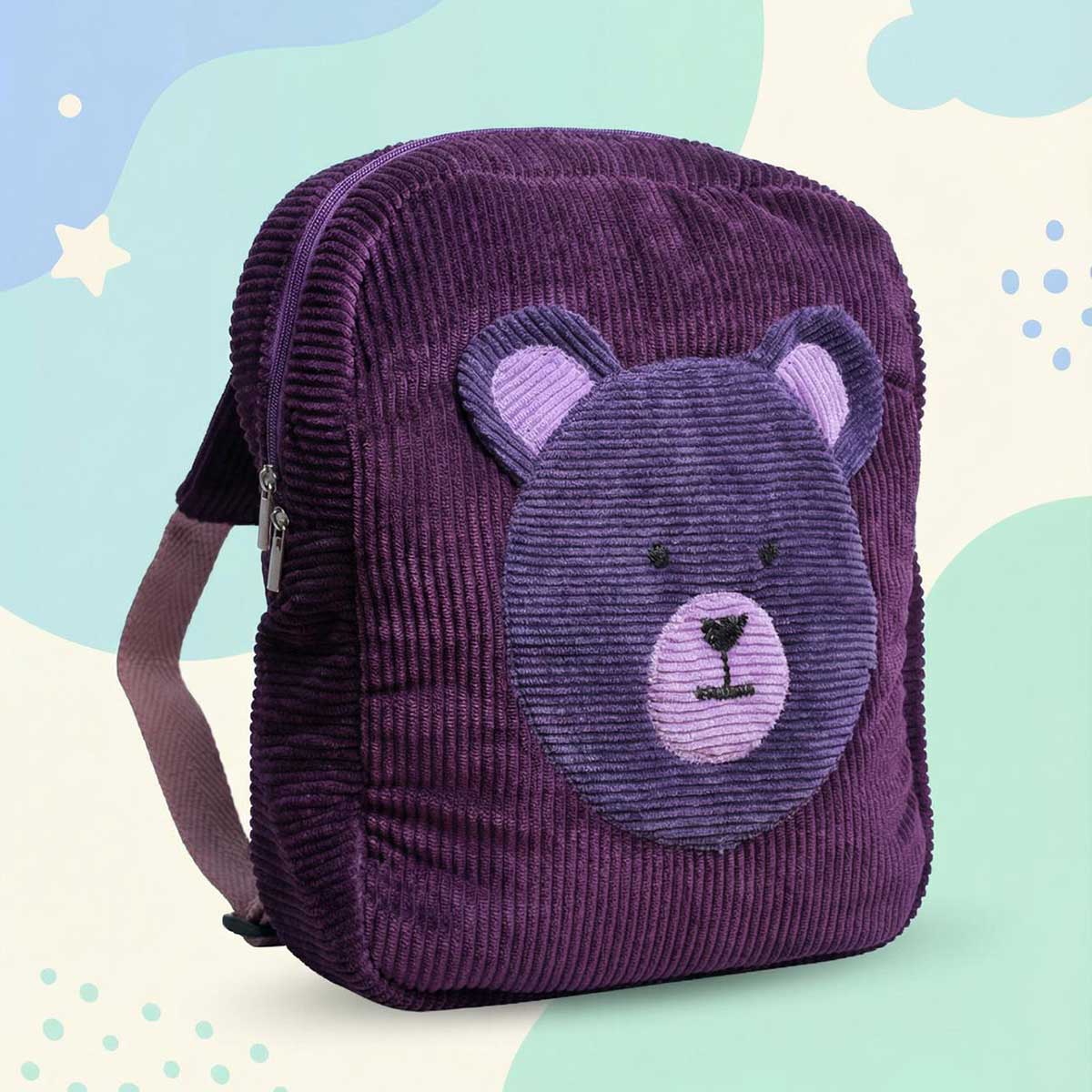 Mochila infantil de pana con oso Vista lateral de mochila infantil de pana con oso